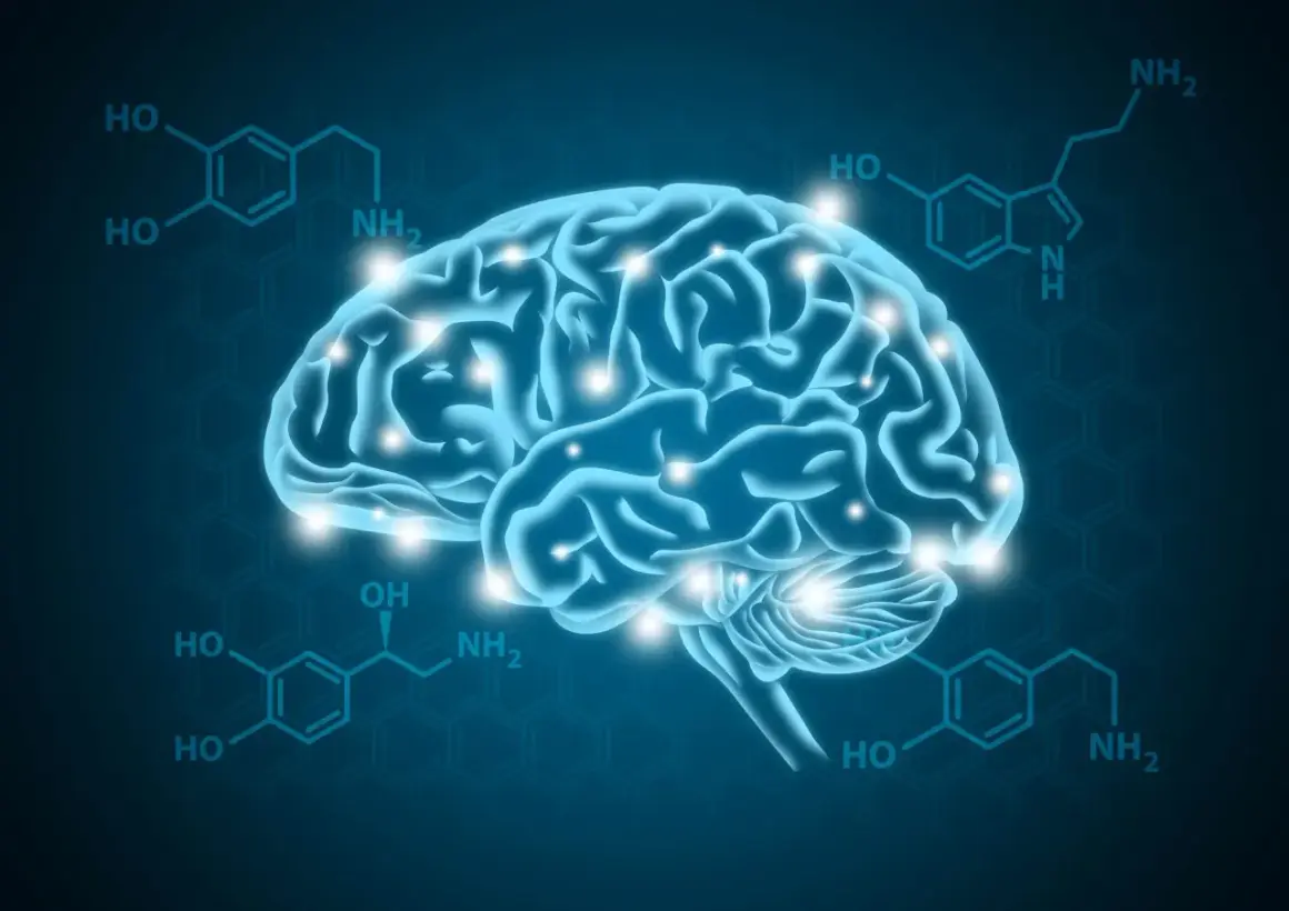 Błękitny mózg z błyskającymi punktami, otoczony wzorami chemicznymi. Ilustracja wyjaśnia, czym jest dopamina, kluczowy neuroprzekaźnik.